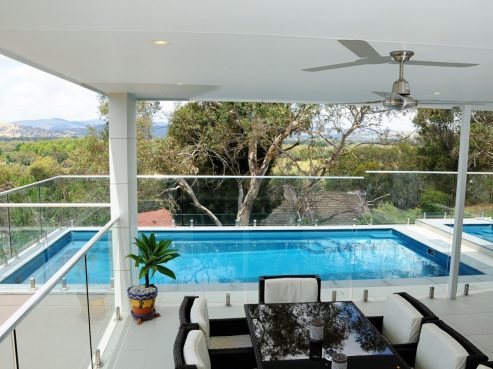 X Trainer pool build above the ground with a self standing spa