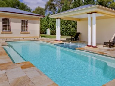 A Sunpod connecting Compass fibreglass pool Vogue with a spa