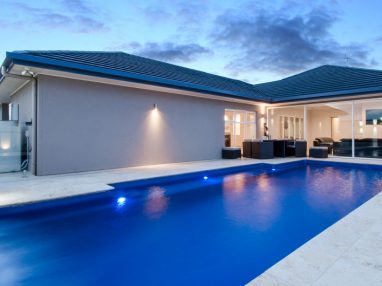 A water wall pool water feature on a Vogue Compass fibreglass pool