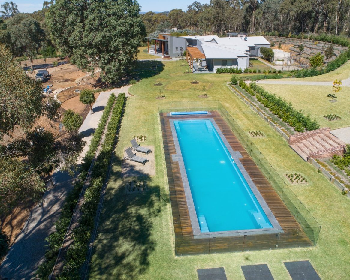 Inground Pools Compass Pools Lap Pool Contemporary fibreglass pool 16.6m custom length in the Evolution colour