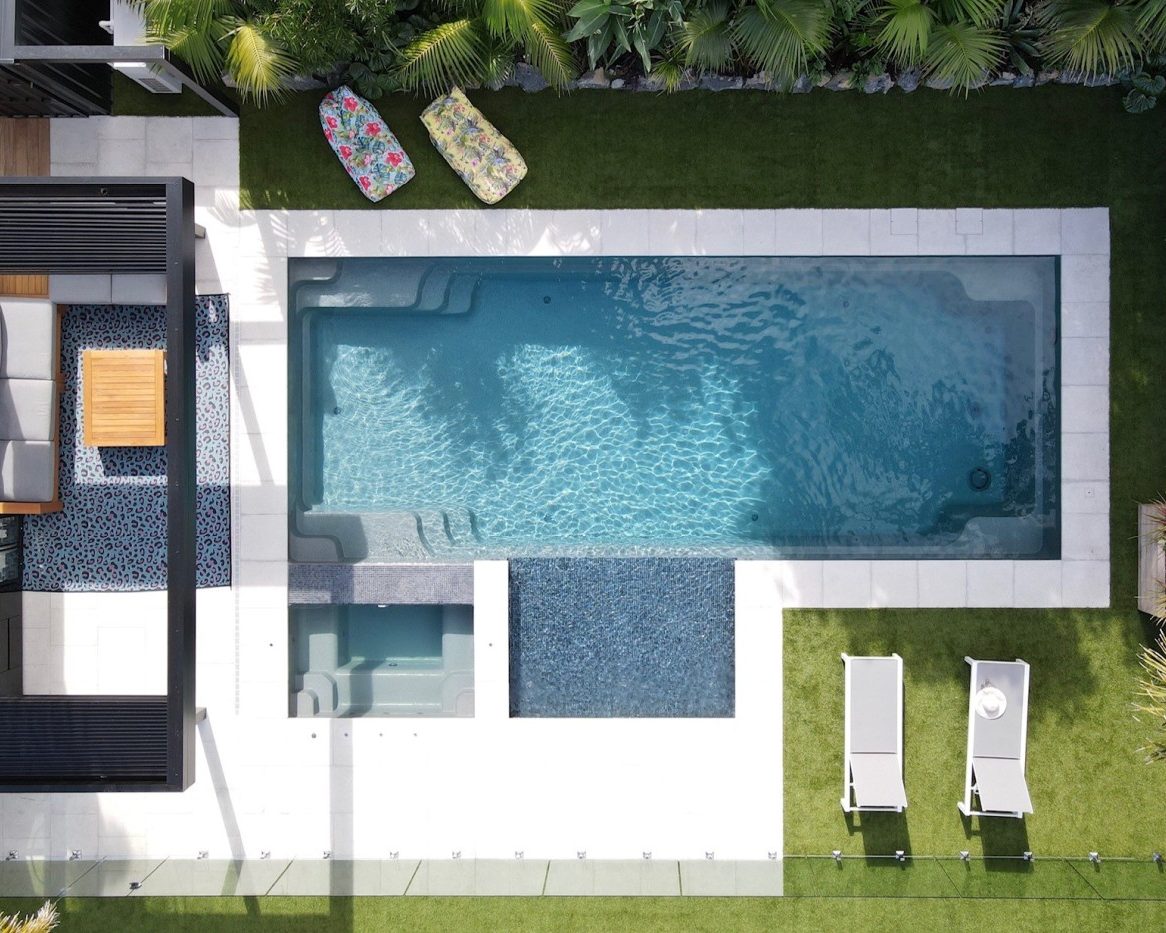 Inground Pools X Trainer self cleaning fibreglass pool and spa installation